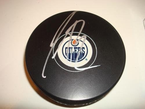 Justin Schultz potpisao Edmonton Oilers Hockey Puck sa autogramom PSA / DNK COA b-potpisanim NHL pakovima