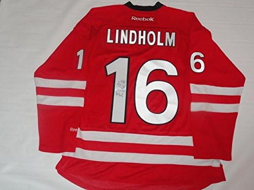 Elias Lindholm potpisao 16 Jersey Carolina Hurricanes licencirani JSA COA - autogramirani NHL dresovi
