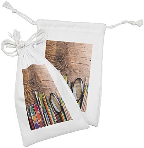 AMBESONNE Šarene torbice od 2, rabljena slikarska oprema na drvenoj stolu izbliza slika olovka